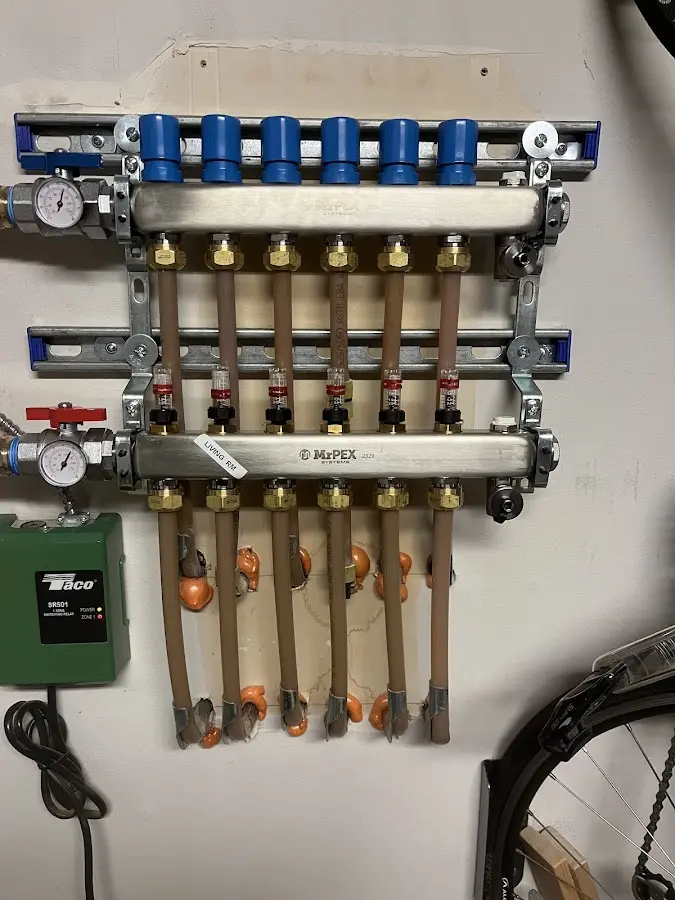 Plumber performing Gas Leak Detection at a residential property in Tewksbury